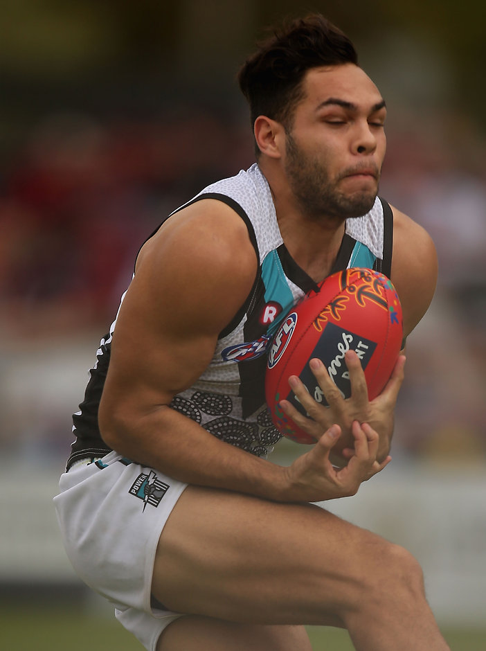 AFL 2016 Rd 10 - Melbourne v Port Adelaide ALICE SPRINGS, AUSTRALIA - MAY 28: Jarman Impey of the Power marks during the 2016 AFL Round 10 match between the Melbourne Demons and Port Adelaide Power at TIO Traeger Park on May 28, 2016 in Alice Springs, Australia. (Photo by Sean Garnsworthy/AFL Media)